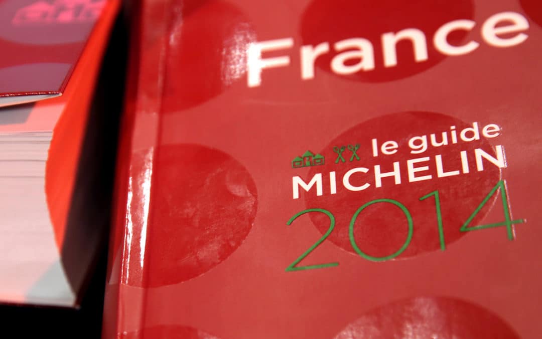 Copies of the new 2014 annual Michelin restaurant guide are presented in Paris